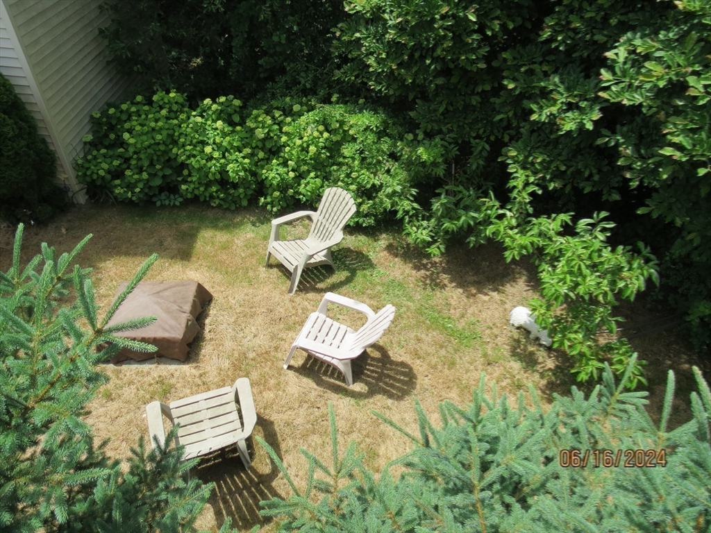 262 Acropolis Road Lowell, MA 01854 - Photo 30 of 31 an aerial view of a house with swimming pool and outdoor seating