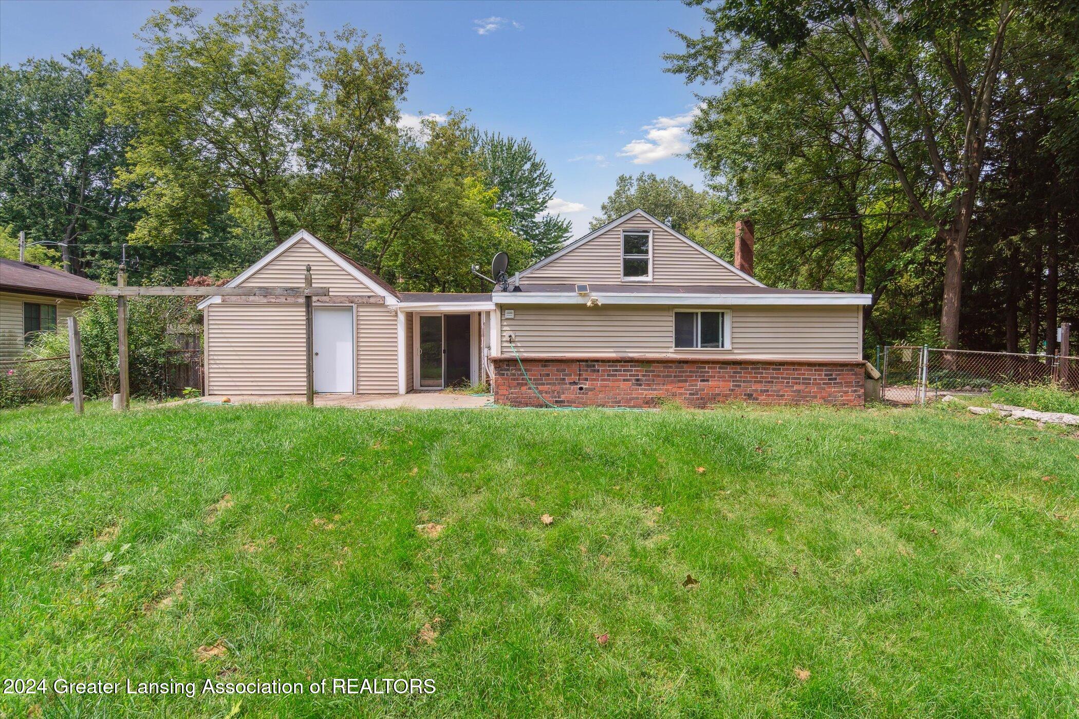 6743 Richard Road Lansing, MI 48911 - Photo 5 of 15 15-6743-Richard-Rd-Lansing-MI-48911-Wind