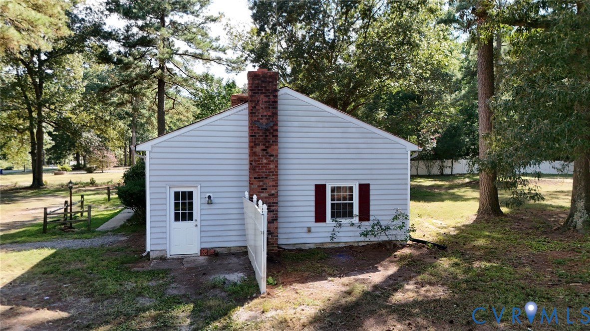 17406 Sandy Ford Road Chesterfield, VA 23838 - Photo 5 of 23 a view of a house with a yard