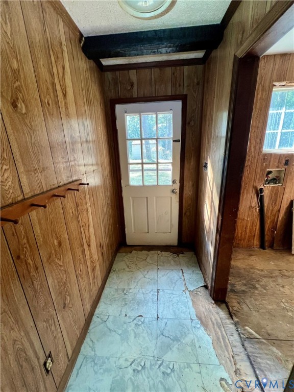 17406 Sandy Ford Road Chesterfield, VA 23838 - Photo 10 of 23 a view of a hallway with wooden walls and a window