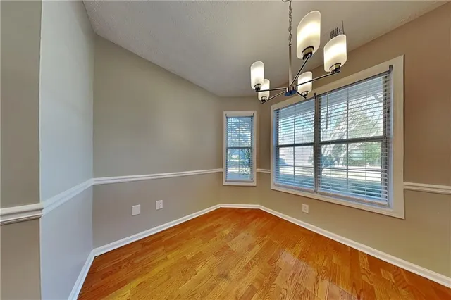 a view of a room with windows