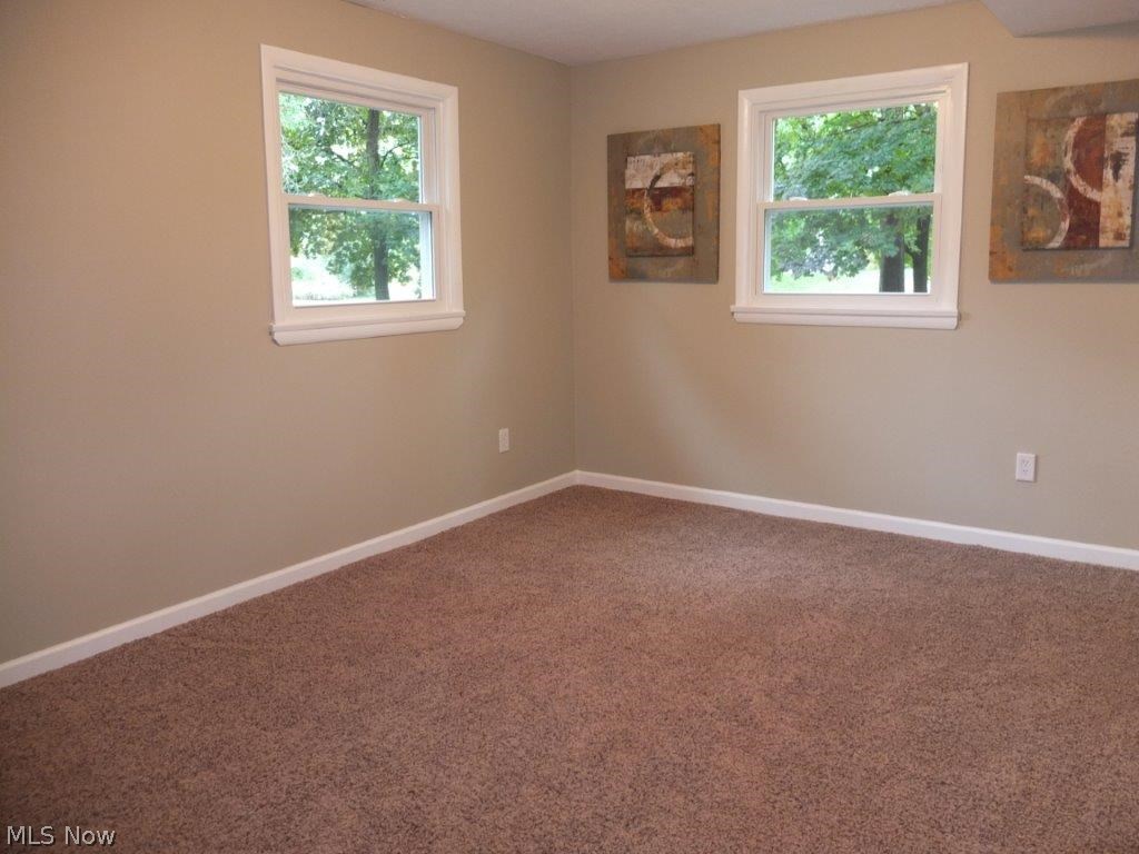 4262 Springdale Road Uniontown, OH 44685 - Photo 13 of 20 Bedroom 4 on the walkout lower level.