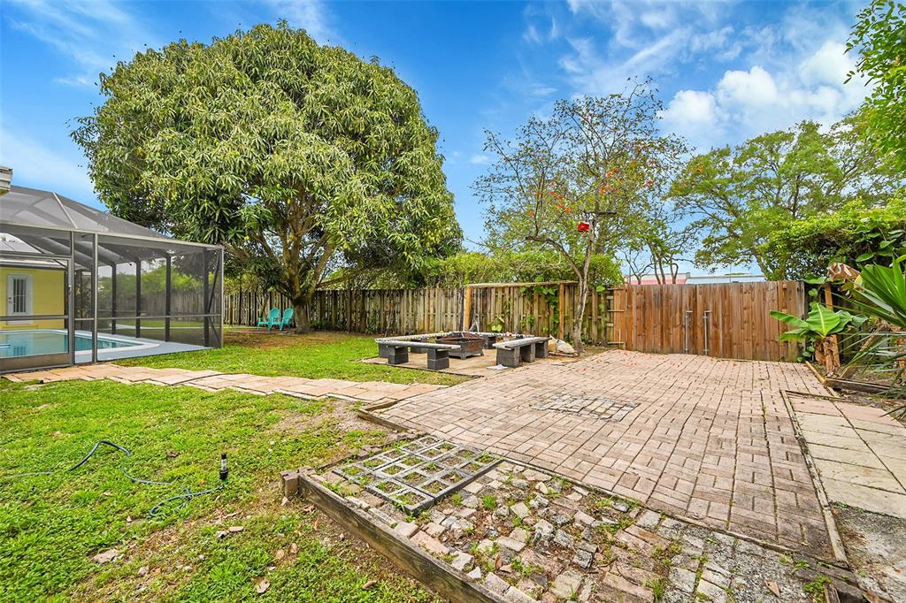 1480 Southwest 66th Terrace Plantation, FL 33317 - Photo 55 of 73 a view of a house with backyard and sitting area