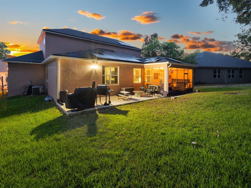 925 Counts Crest Circle Apopka, FL 32712 - Photo 5 of 36 a view of a house with backyard and sitting area