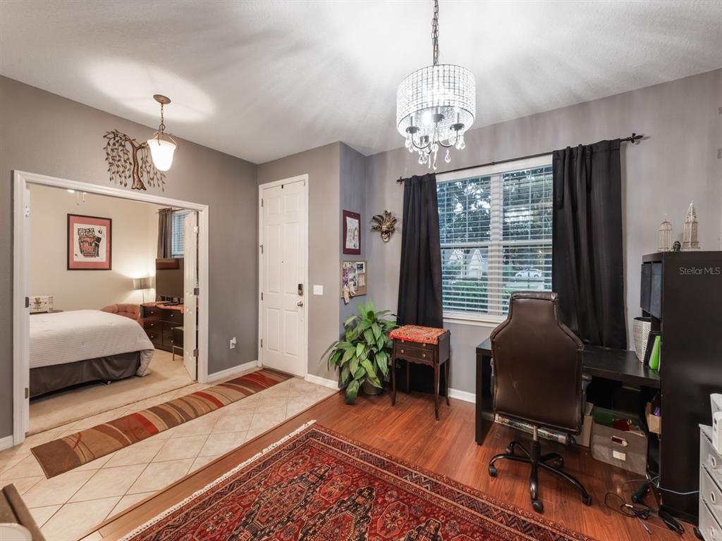 925 Counts Crest Circle Apopka, FL 32712 - Photo 7 of 36 a bedroom with bed or couch and a window