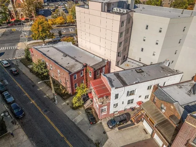 an aerial view of a house with outdoor space