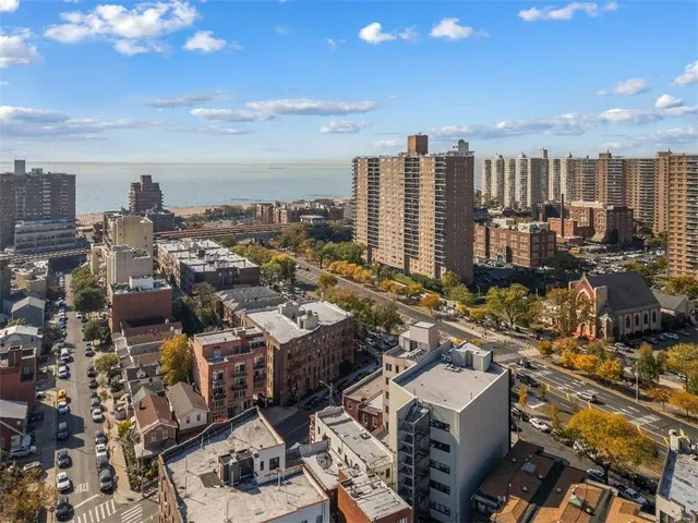 a kitchen with a stove and a refrigerator