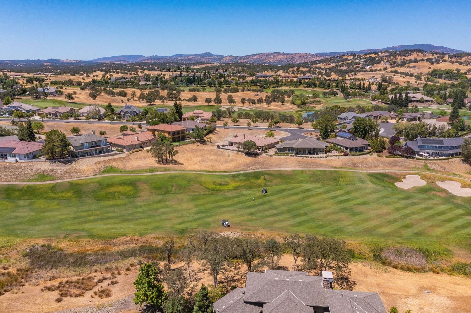 10 Flagstone Court, Unit 1 COPPER RIDGE 32 Copperopolis, CA 95228 - Photo 5 of 31 a view of a city with ocean view