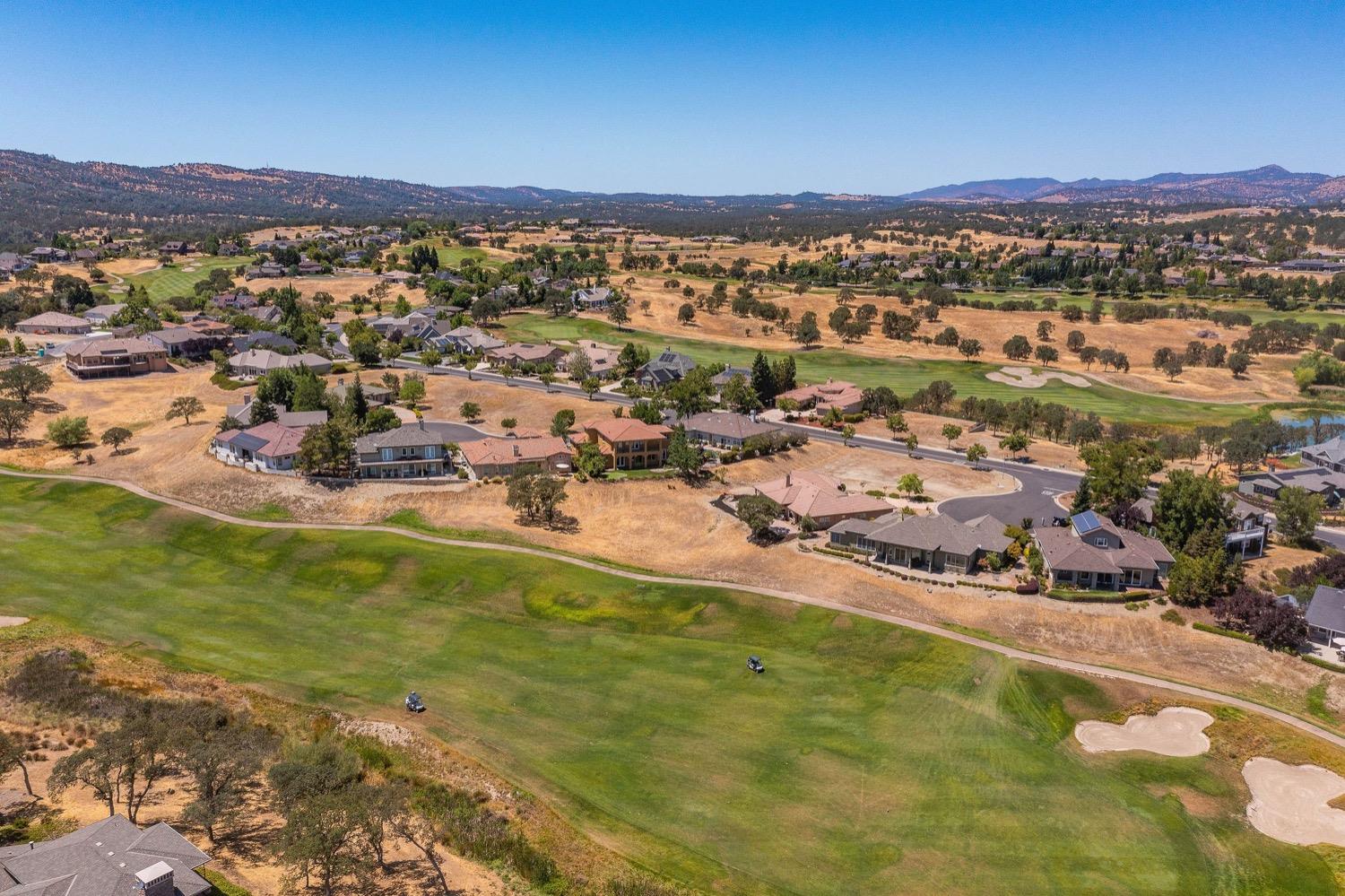 10 Flagstone Court, Unit 1 COPPER RIDGE 32 Copperopolis, CA 95228 - Photo 7 of 31 a view of a city with mountains in the background
