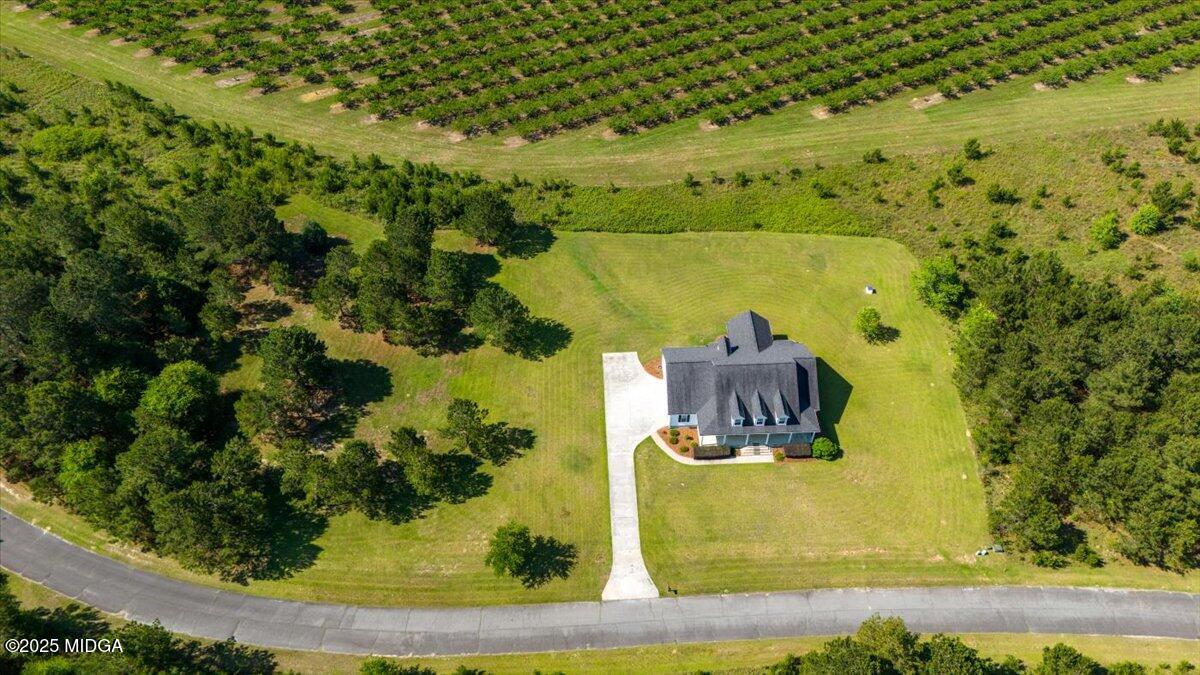 236 Woodland Trail Road Cochran, GA 31014 - Photo 4 of 13 an aerial view of a residential houses with outdoor space