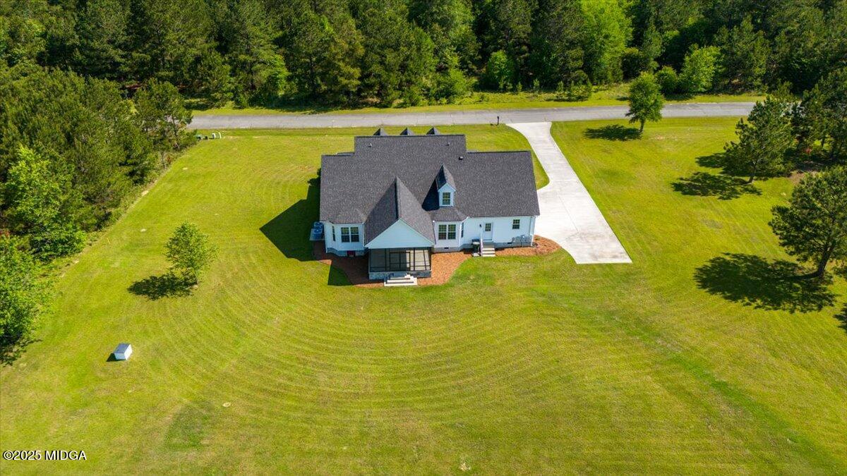 236 Woodland Trail Road Cochran, GA 31014 - Photo 7 of 13 a view of a swimming pool with an ocean view