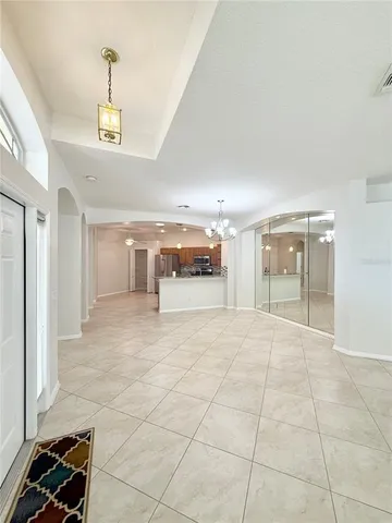 a big room with closet and windows