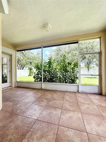 a view of a garden with an outdoor seating