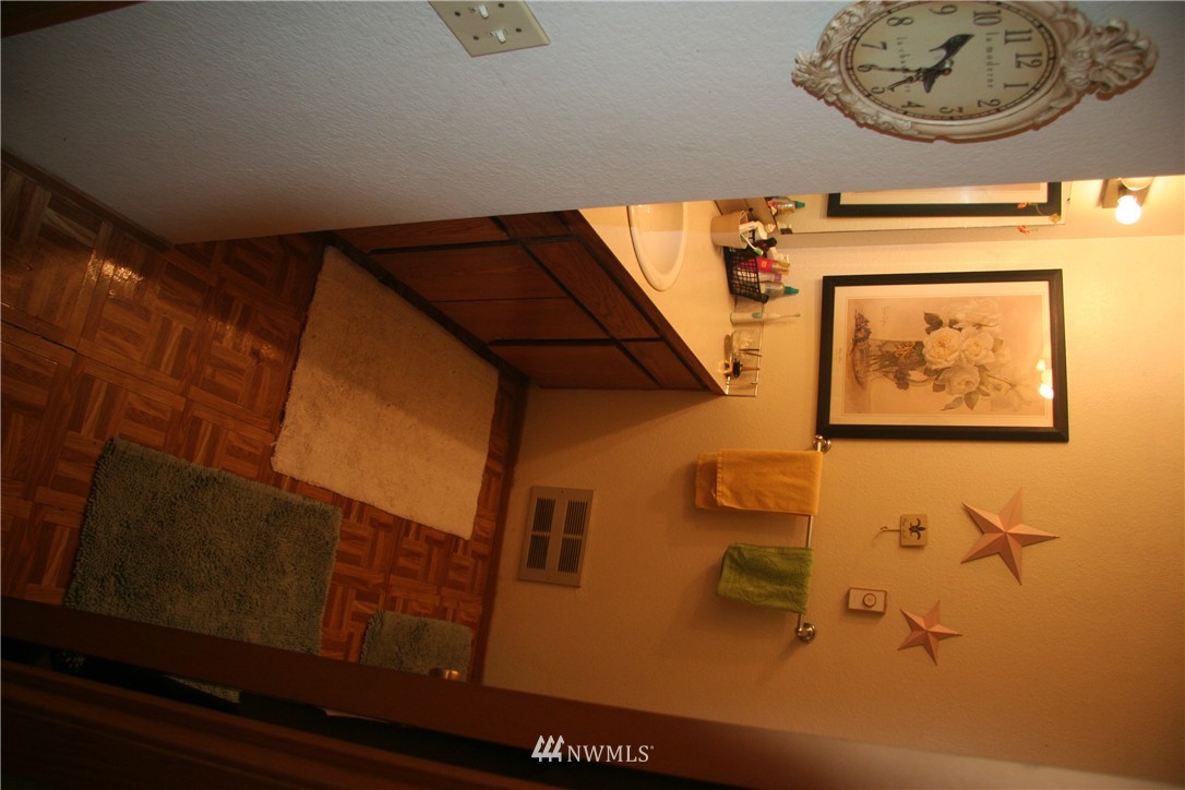 15 Madison Street Everett, WA 98203 - Photo 6 of 8 a bathroom with a sink and a mirror