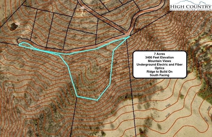 Lot#39 Westfield Drive Crumpler, NC 28617 - Photo 1 of 15 a sign on a wall next to a building