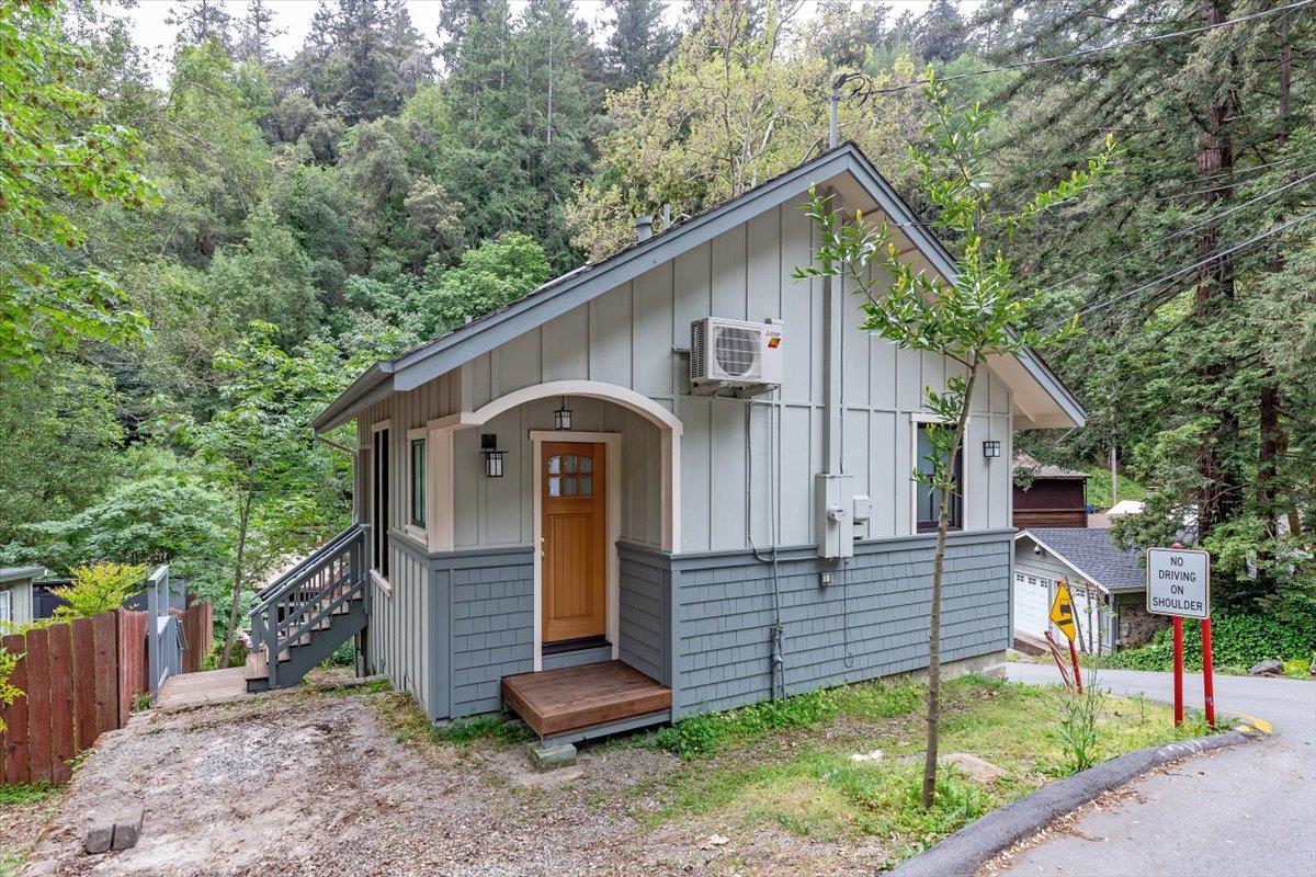 a front view of a house with garden