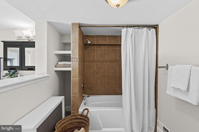 1444 Henry Street Baltimore, MD 21230 - Photo 15 of 18 Serene bathroom retreat with modern touches.