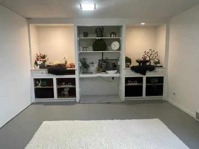 a view of a living room with furniture