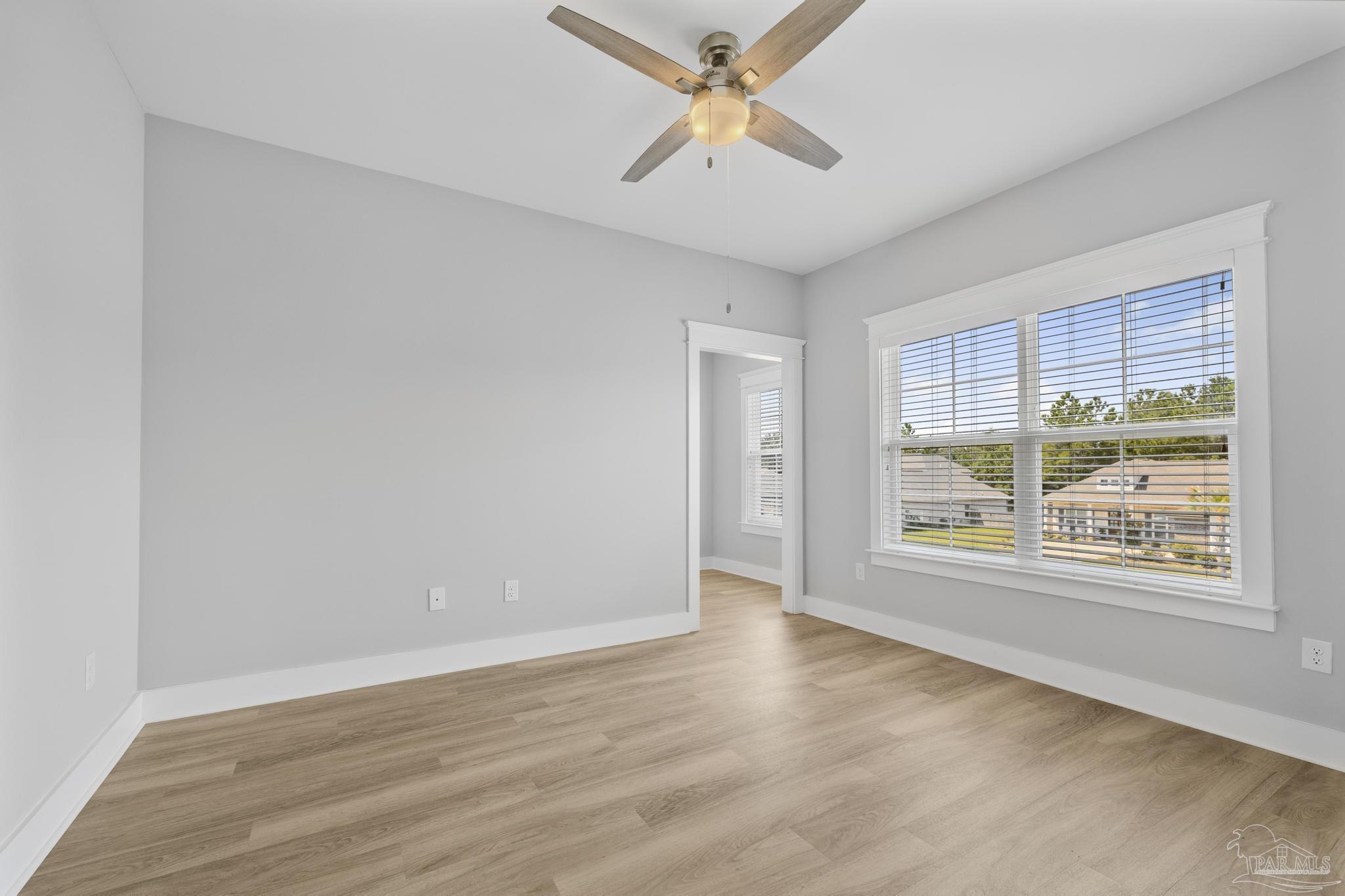 6264 Howie Way Pace, FL 32571 - Photo 25 of 42 a view of an empty room with a window