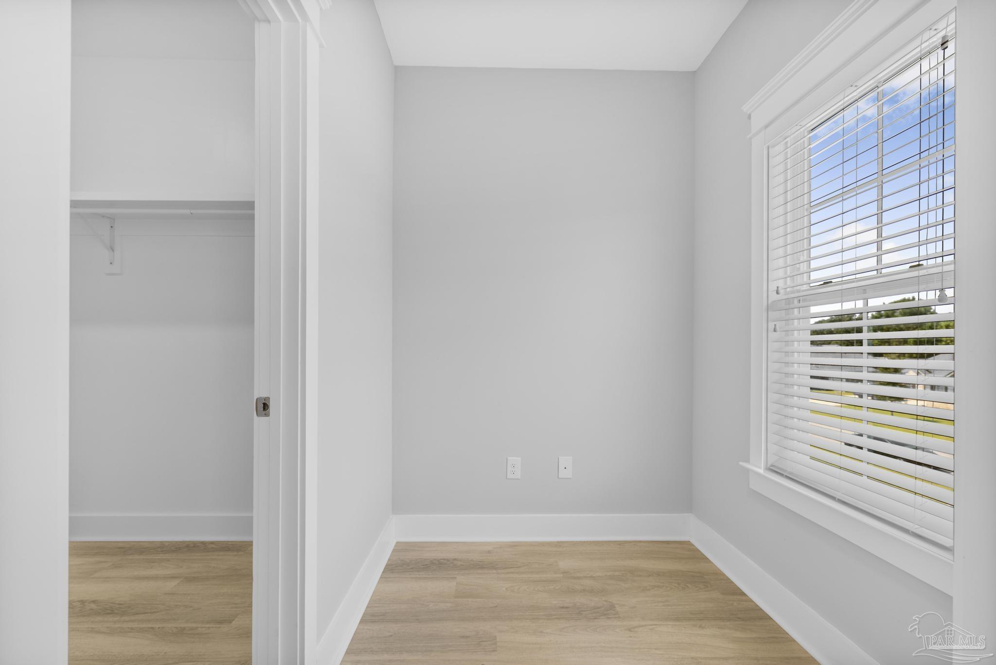 6264 Howie Way Pace, FL 32571 - Photo 27 of 42 a view of an empty room with a window