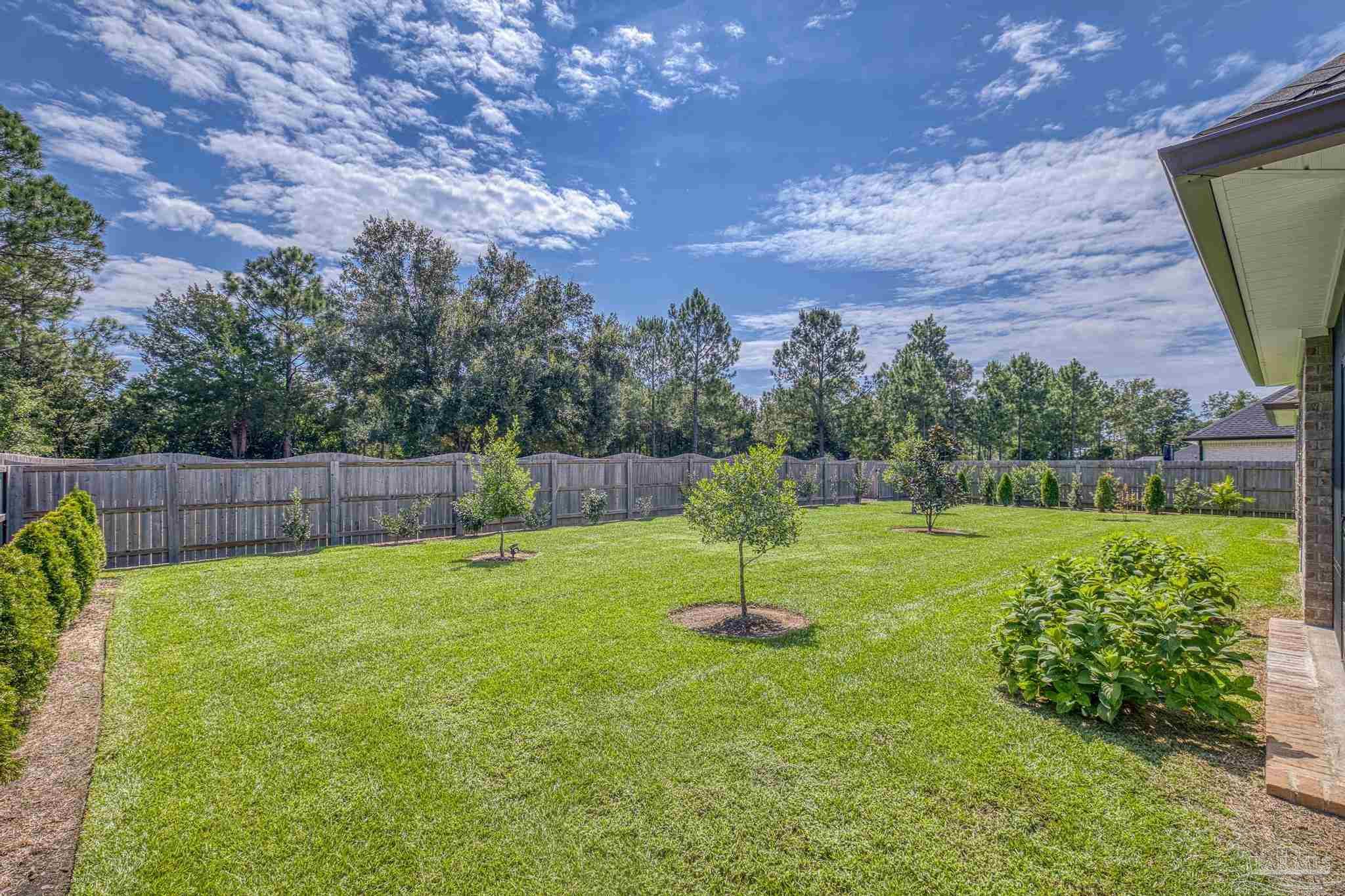 6264 Howie Way Pace, FL 32571 - Photo 31 of 42 a view of a backyard