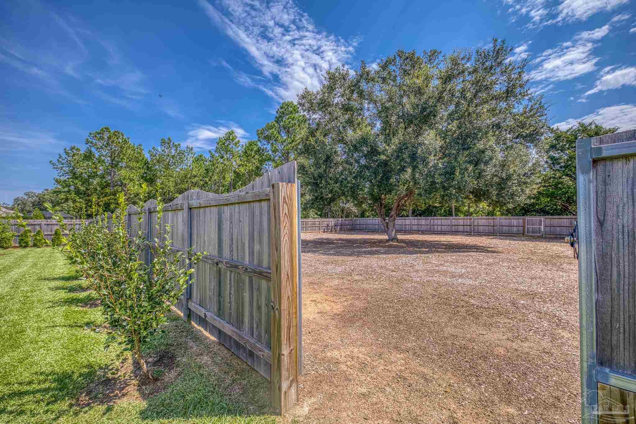 6264 Howie Way Pace, FL 32571 - Photo 34 of 42 a view of a backyard