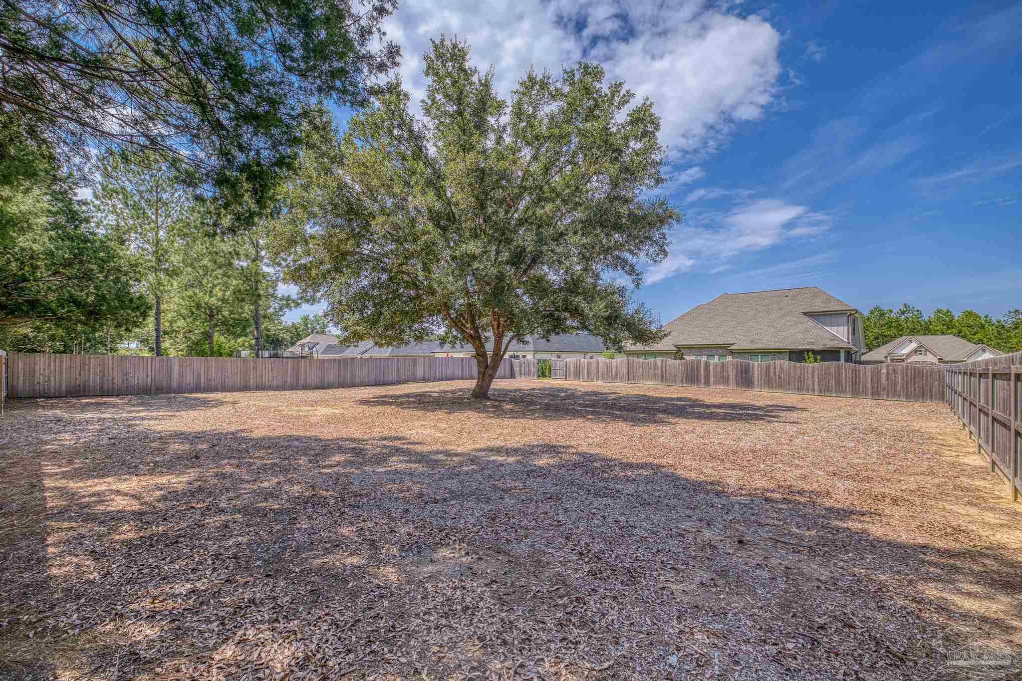 6264 Howie Way Pace, FL 32571 - Photo 35 of 42 a view of backyard of green space