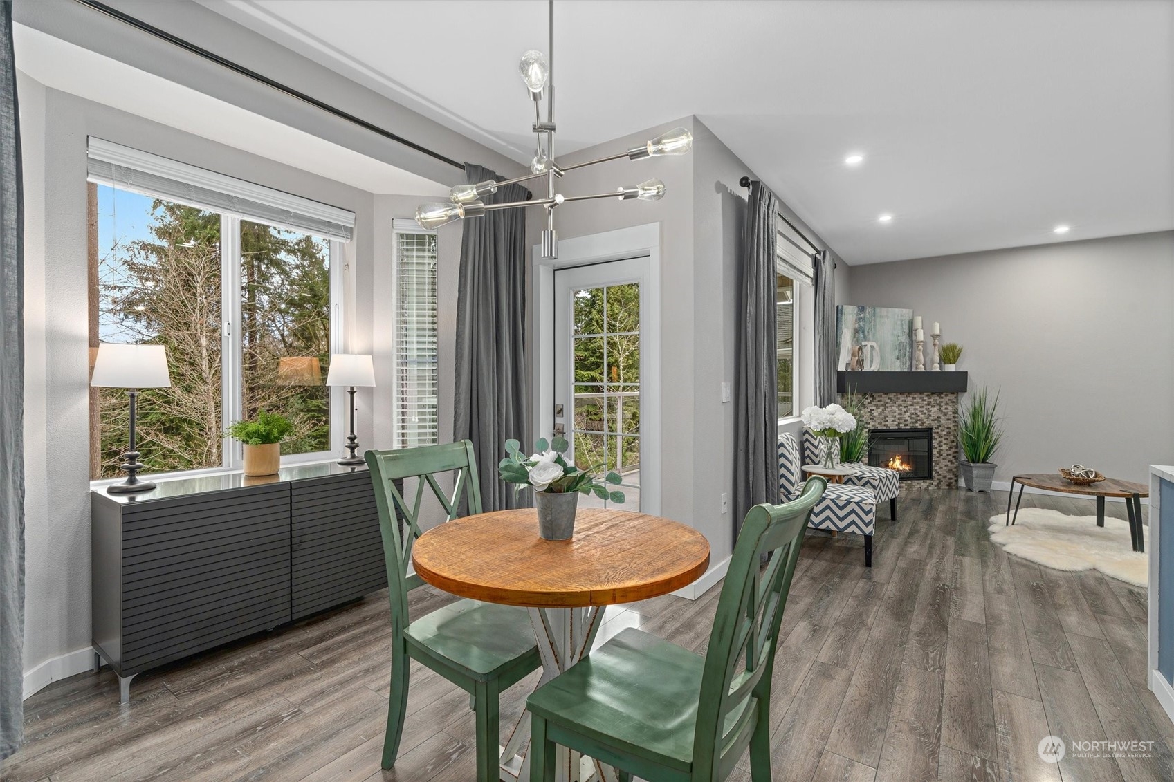 2810 Southeast 8th Street, Unit 2131 Renton, WA 98058 - Photo 12 of 35 a dinning table and chairs in a room