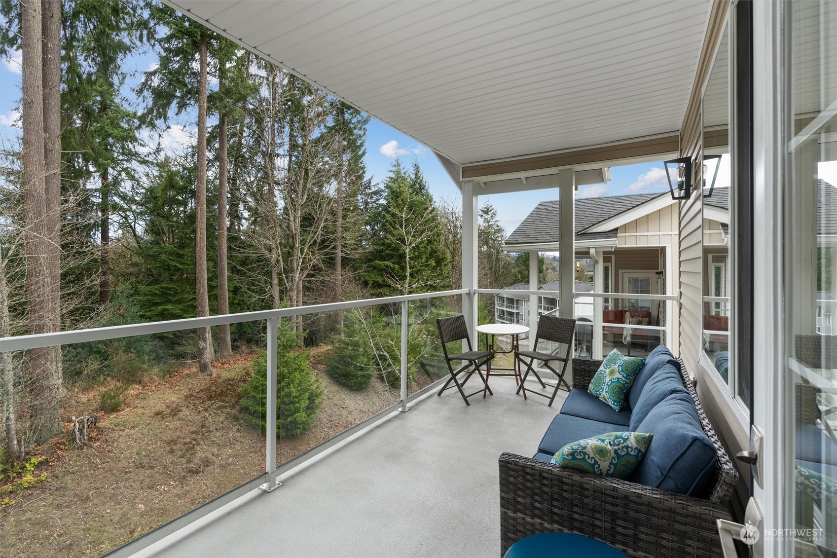 2810 Southeast 8th Street, Unit 2131 Renton, WA 98058 - Photo 13 of 35 a view of a couches and fire pit in the balcony