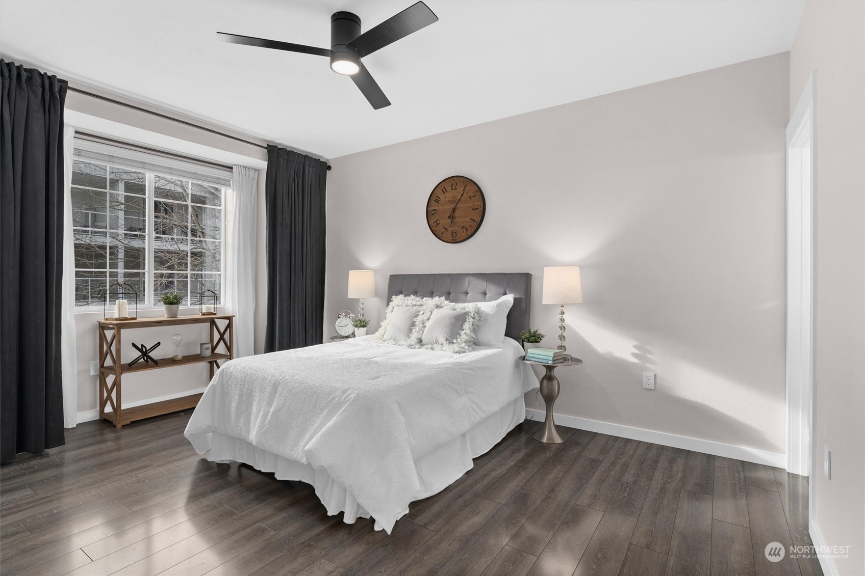 2810 Southeast 8th Street, Unit 2131 Renton, WA 98058 - Photo 16 of 35 a bedroom with a bed and a window