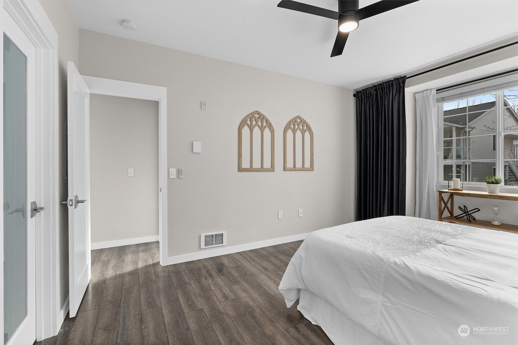 2810 Southeast 8th Street, Unit 2131 Renton, WA 98058 - Photo 17 of 35 a bedroom with a bed and a window