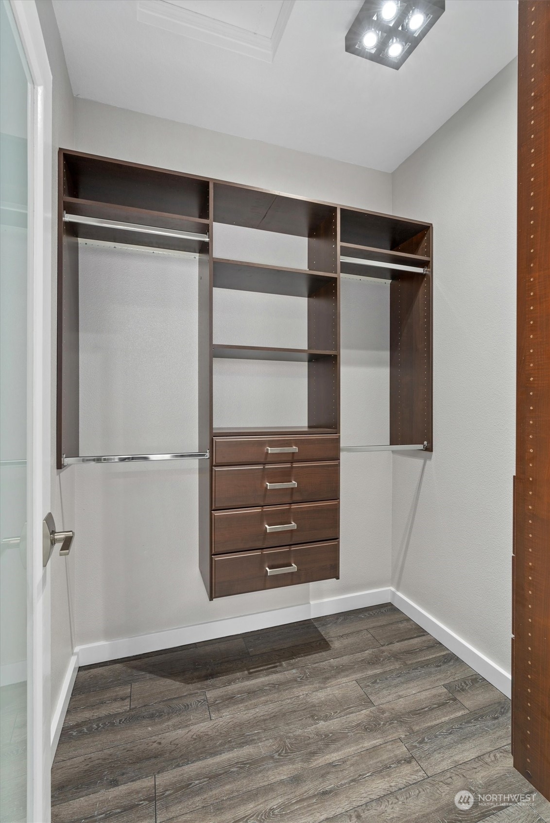 2810 Southeast 8th Street, Unit 2131 Renton, WA 98058 - Photo 20 of 35 a view of walk in closet with empty racks