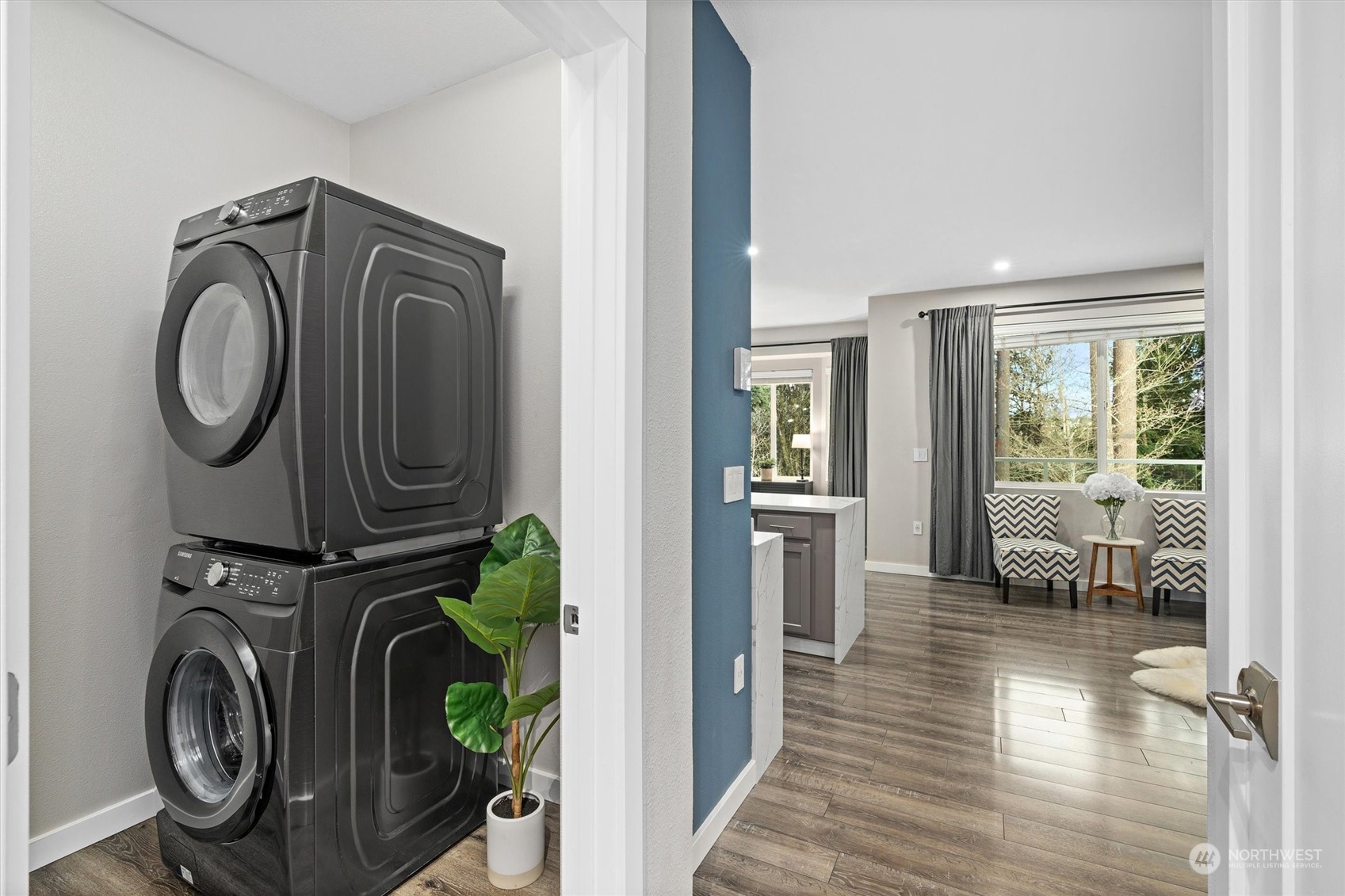 2810 Southeast 8th Street, Unit 2131 Renton, WA 98058 - Photo 24 of 35 a view of a hallway with washer and dryer