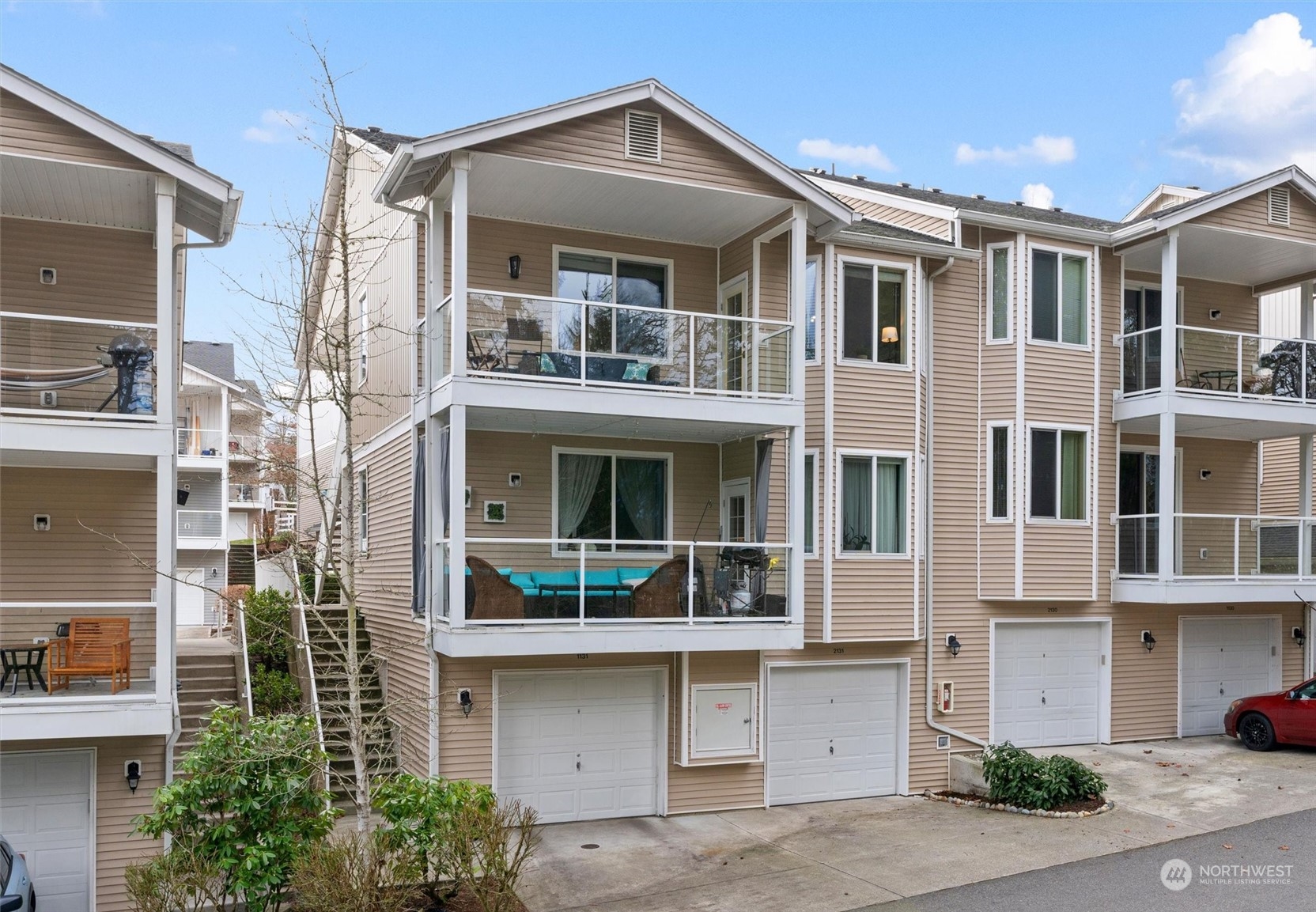 2810 Southeast 8th Street, Unit 2131 Renton, WA 98058 - Photo 25 of 35 a front view of a building with glass windows
