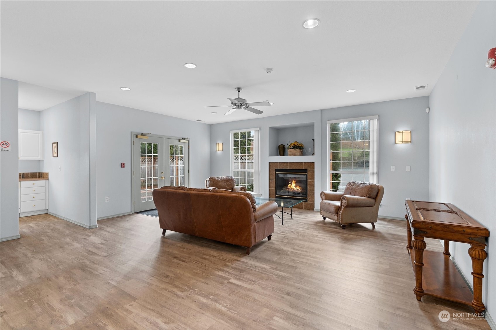 2810 Southeast 8th Street, Unit 2131 Renton, WA 98058 - Photo 31 of 35 a living room with furniture and a fireplace