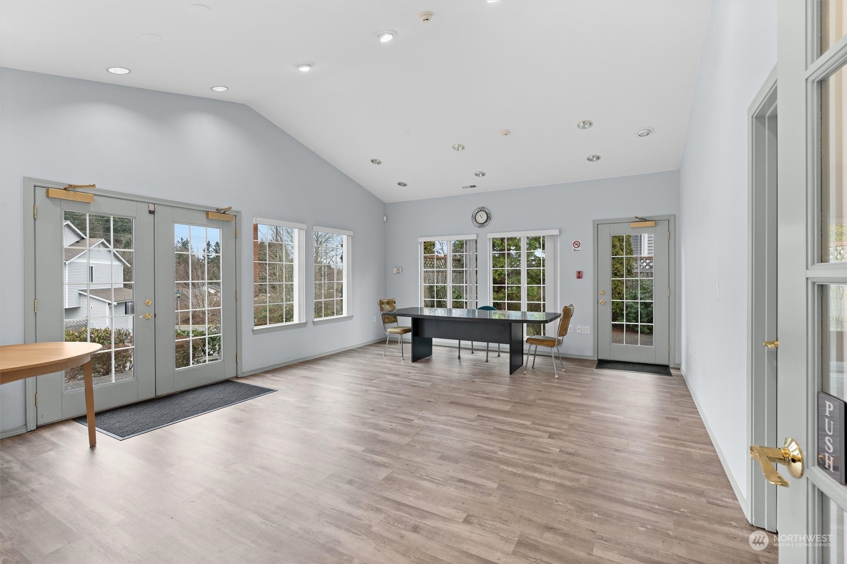 2810 Southeast 8th Street, Unit 2131 Renton, WA 98058 - Photo 33 of 35 a view of an empty room with window and wooden floor