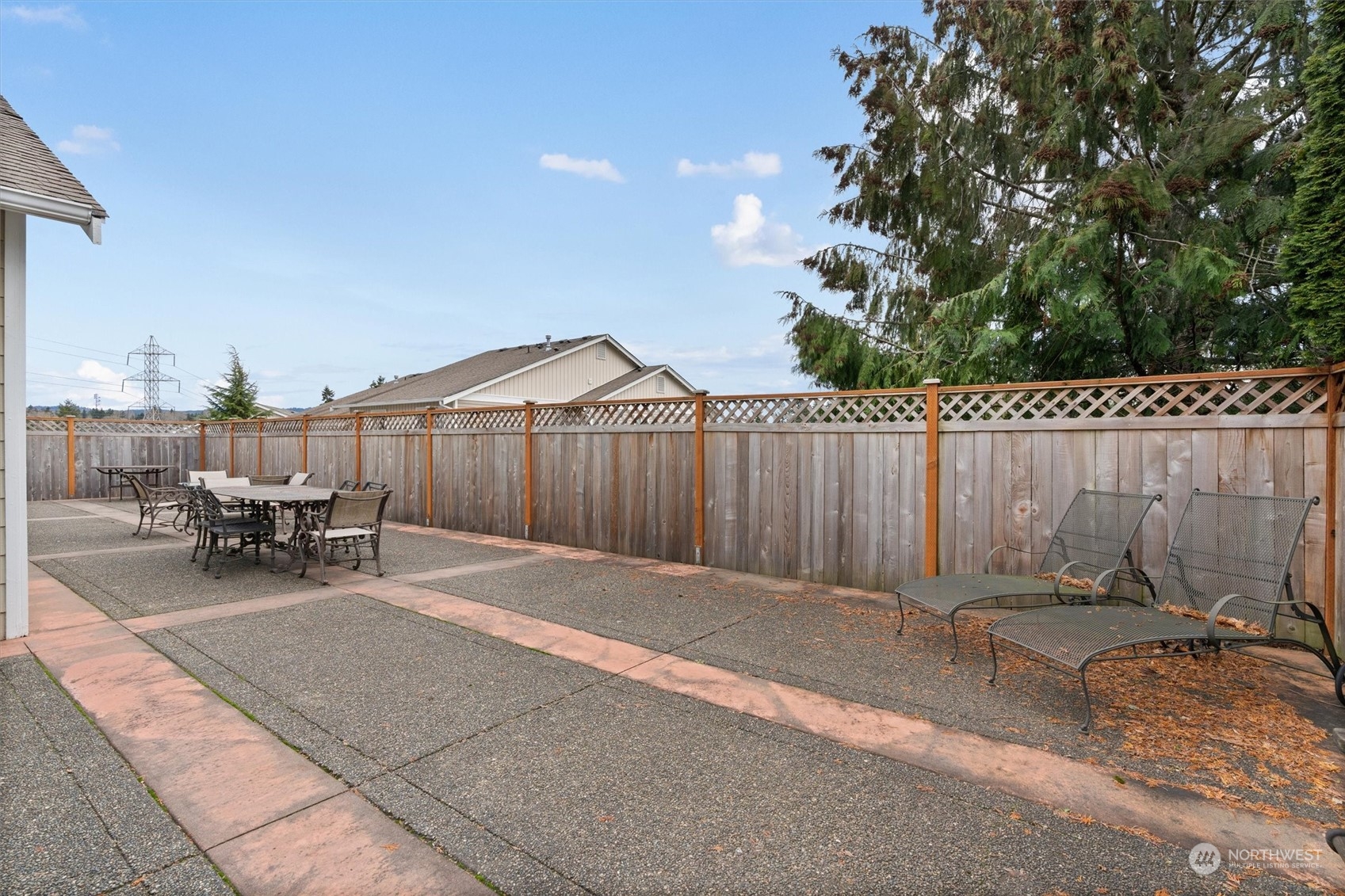 2810 Southeast 8th Street, Unit 2131 Renton, WA 98058 - Photo 34 of 35 a view of a backyard with a sitting area and furniture