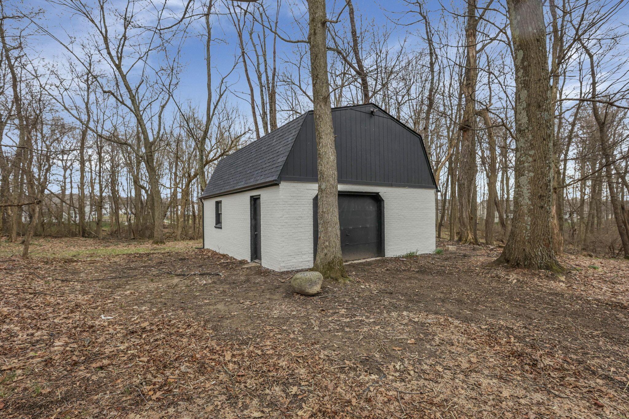 5289 Hazelton-Etna Road Southwest Pataskala, OH 43062 - Photo 42 of 67 Detached garage - would make a great workshop or storage for all your lawn apparatus!