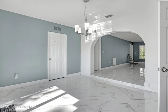 a view of a chandelier in a room