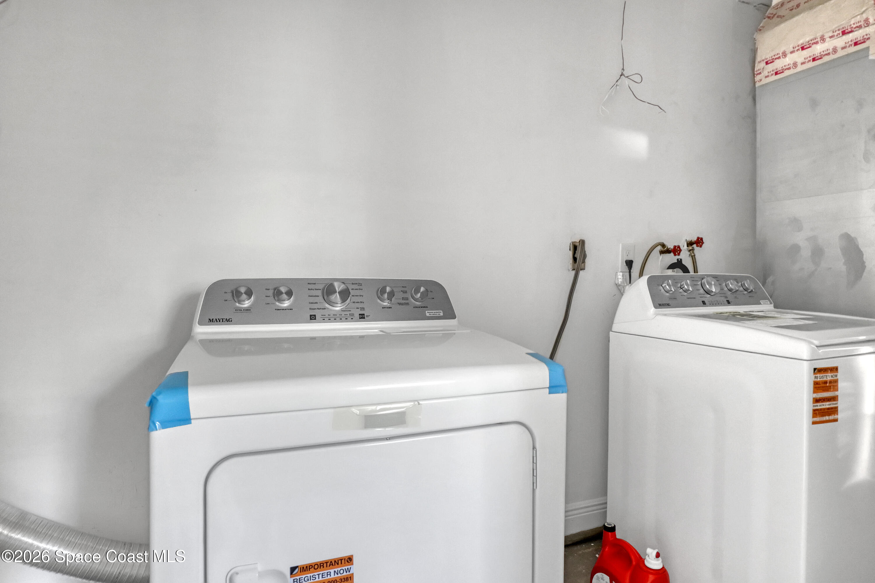 1051 Grove Avenue Cocoa, FL 32922 - Photo 16 of 38 a utility room with dryer and washer