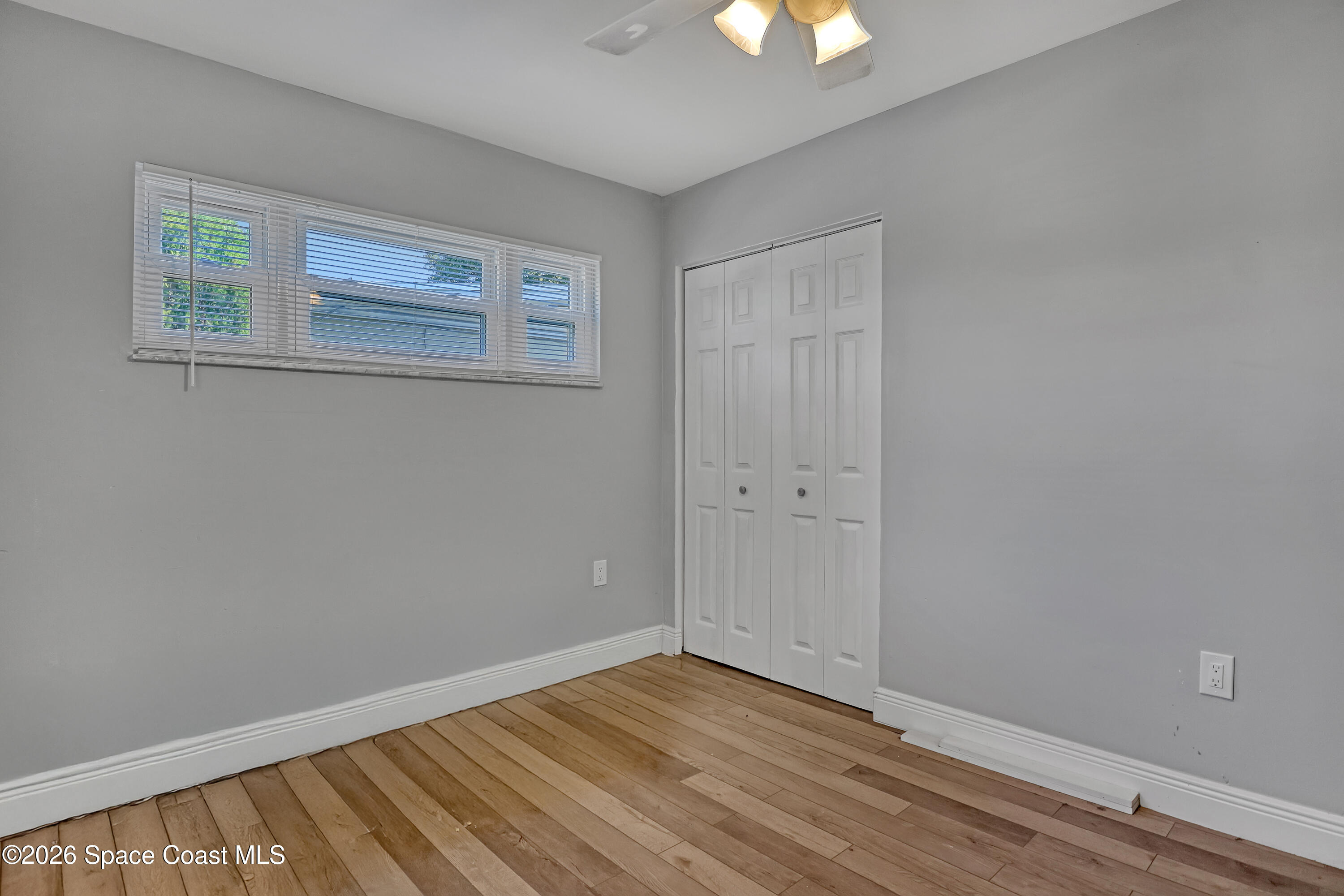 1051 Grove Avenue Cocoa, FL 32922 - Photo 21 of 38 wooden floor in an empty room