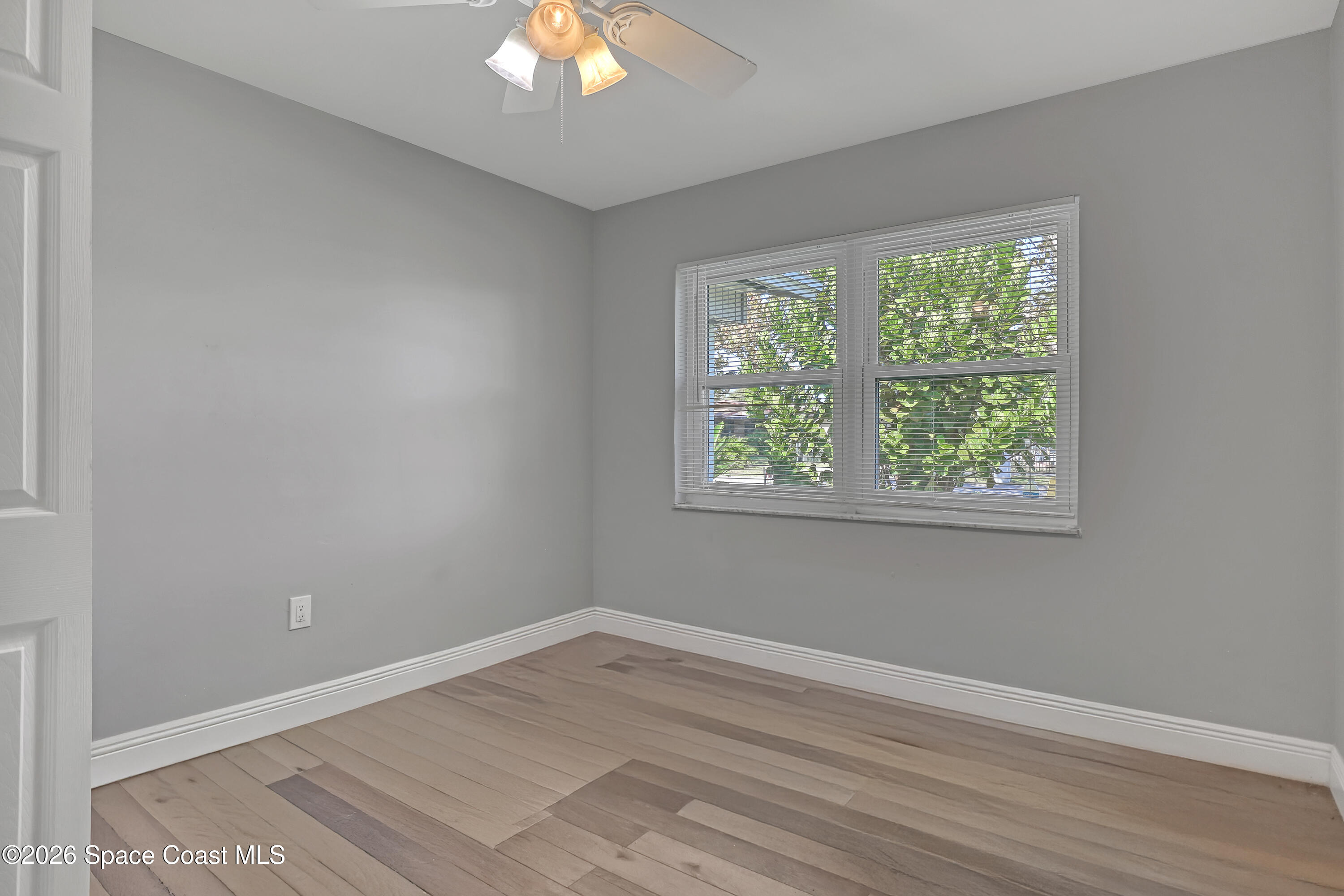 1051 Grove Avenue Cocoa, FL 32922 - Photo 23 of 38 an empty room with a window