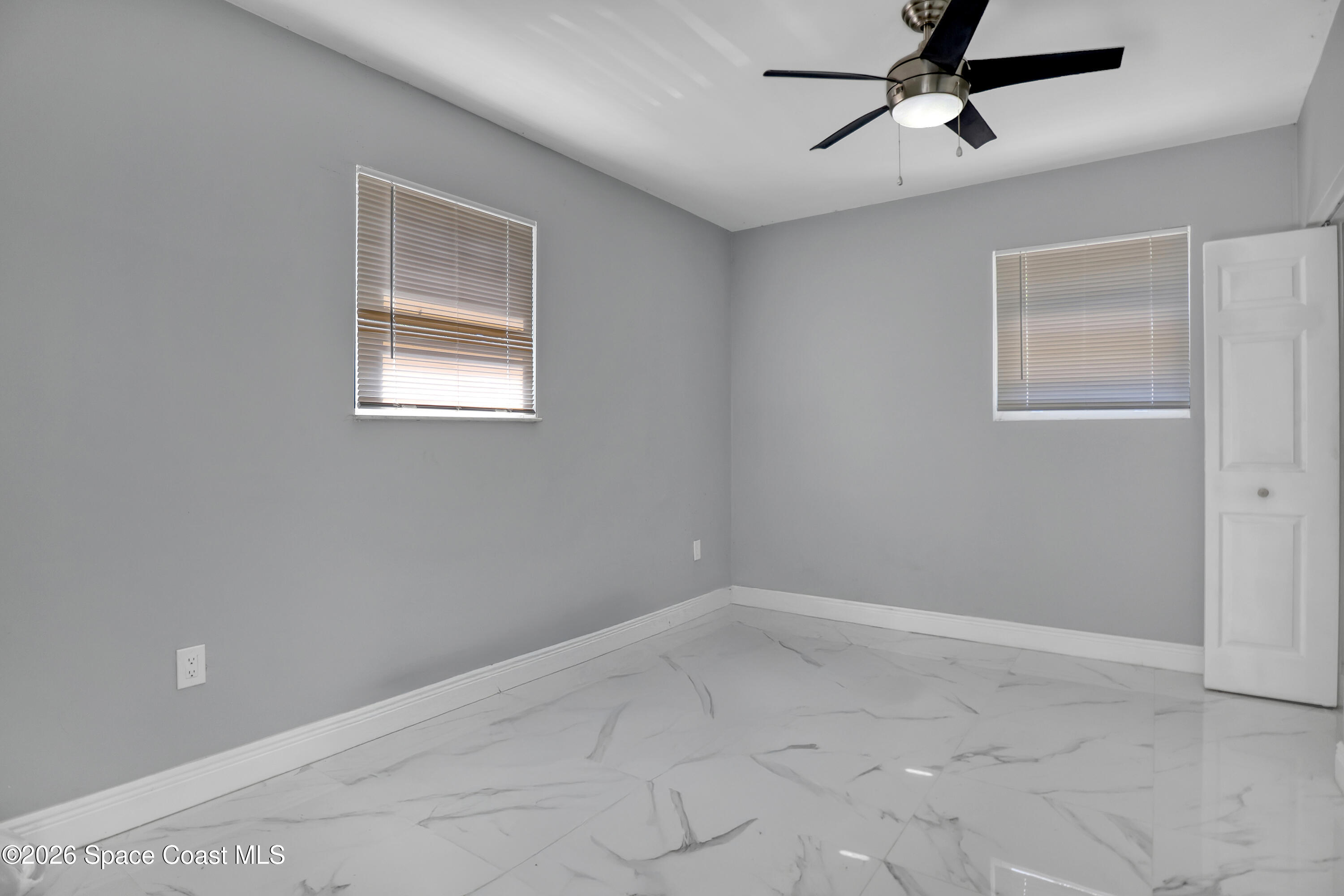 1051 Grove Avenue Cocoa, FL 32922 - Photo 24 of 38 a view of a livingroom with a window
