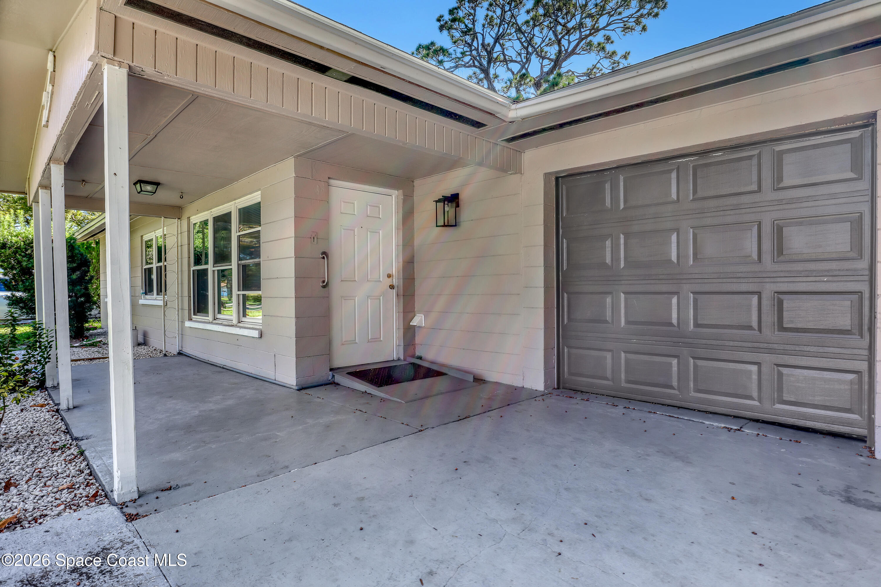 1051 Grove Avenue Cocoa, FL 32922 - Photo 4 of 38 a view of a house with a outdoor space