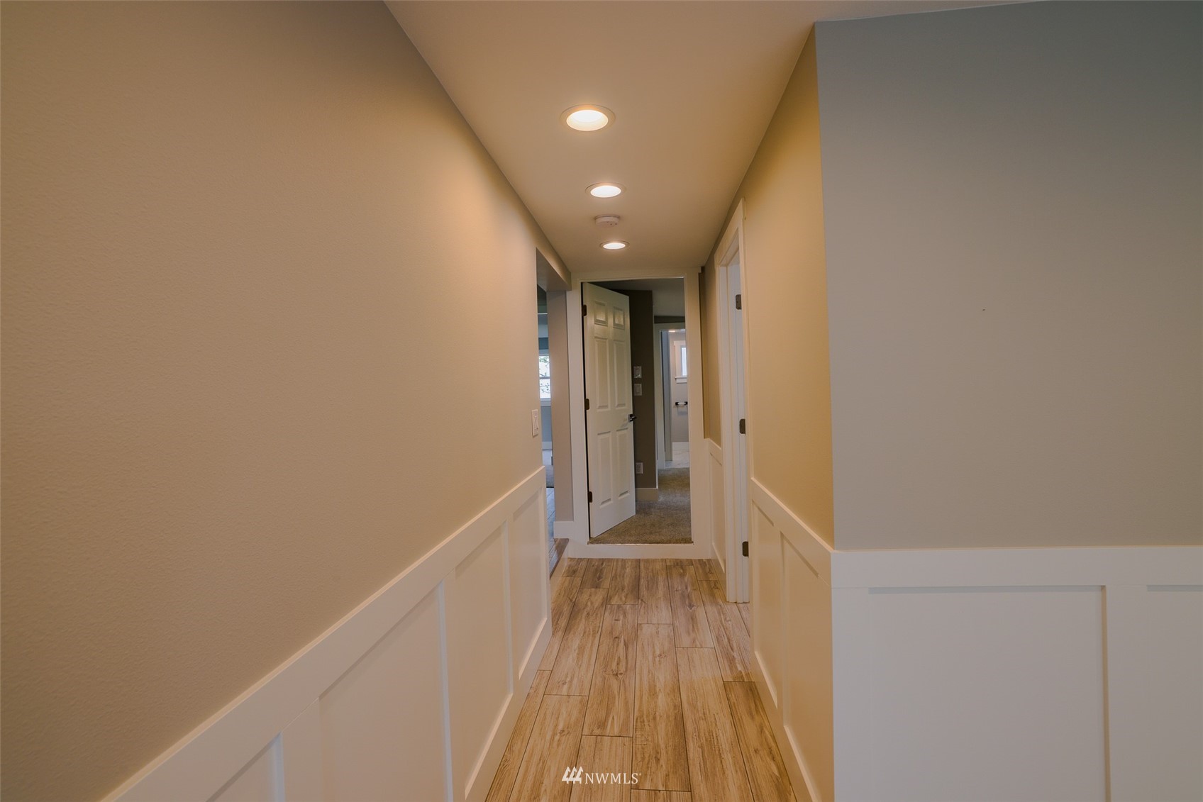3504 Seattle Hill Road, Unit 2 Mill Creek, WA 98012 - Photo 13 of 30 a view of a hallway with wooden floor