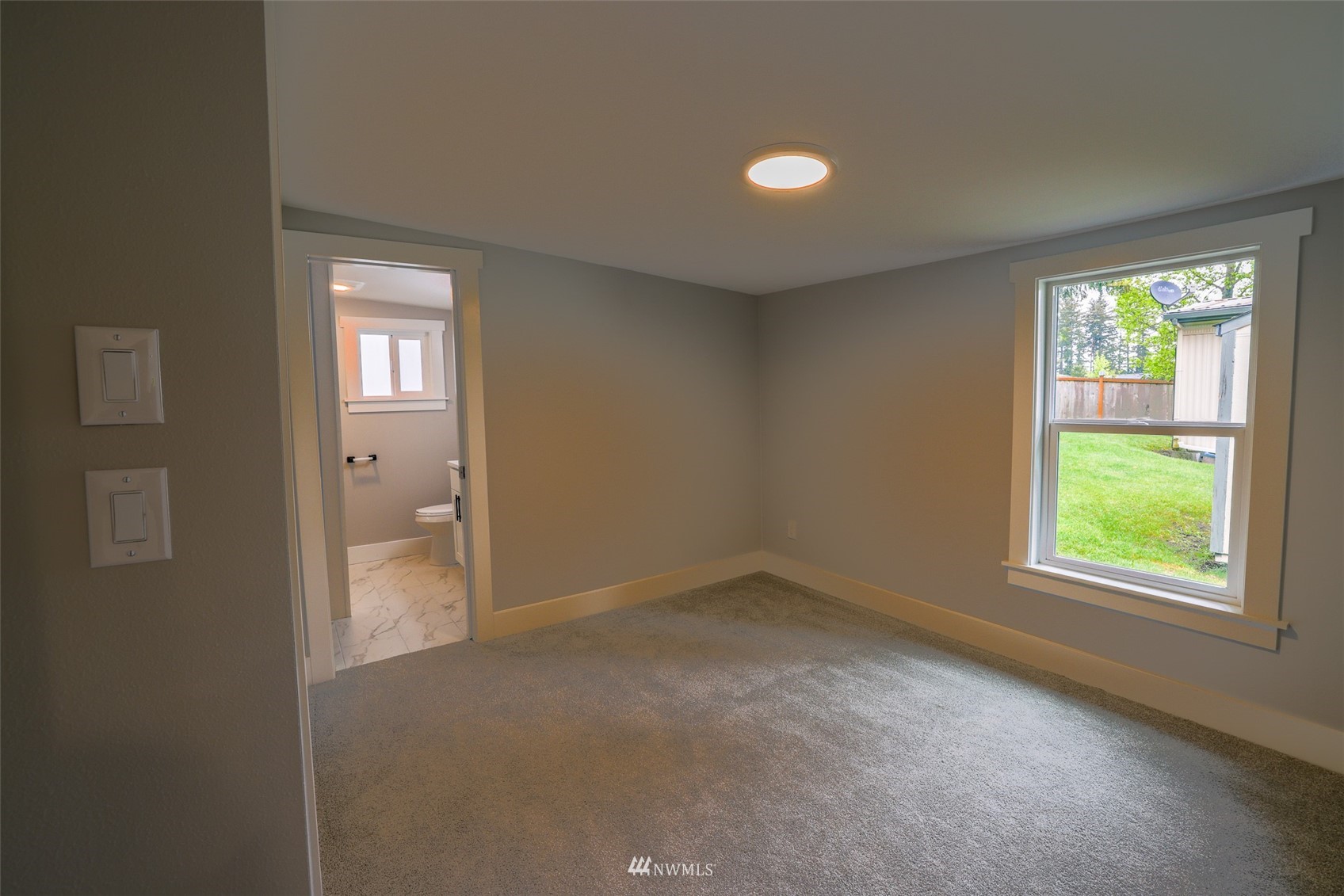 3504 Seattle Hill Road, Unit 2 Mill Creek, WA 98012 - Photo 15 of 30 an empty room with windows and closet