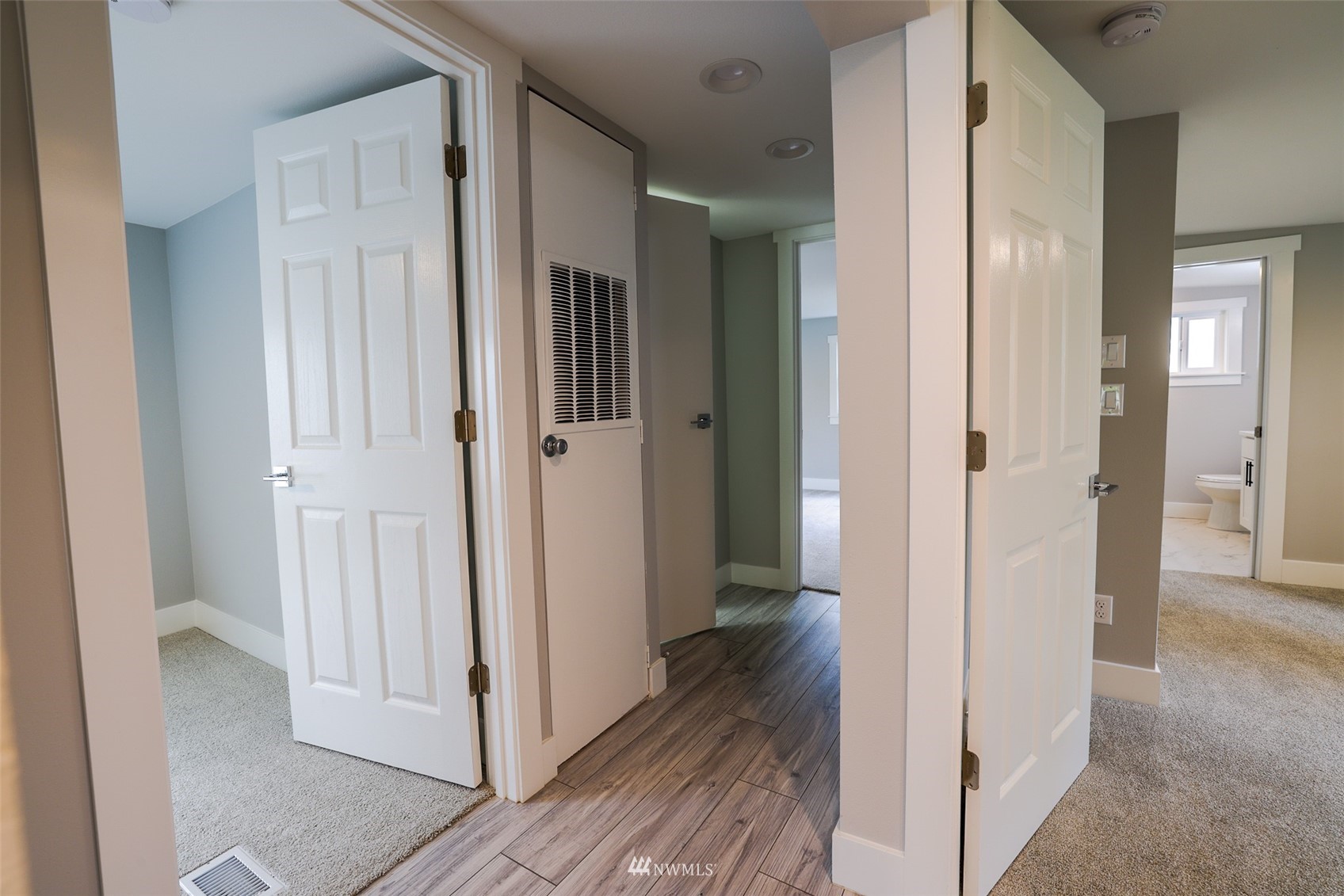 3504 Seattle Hill Road, Unit 2 Mill Creek, WA 98012 - Photo 20 of 30 a view of a hallway with wooden floor