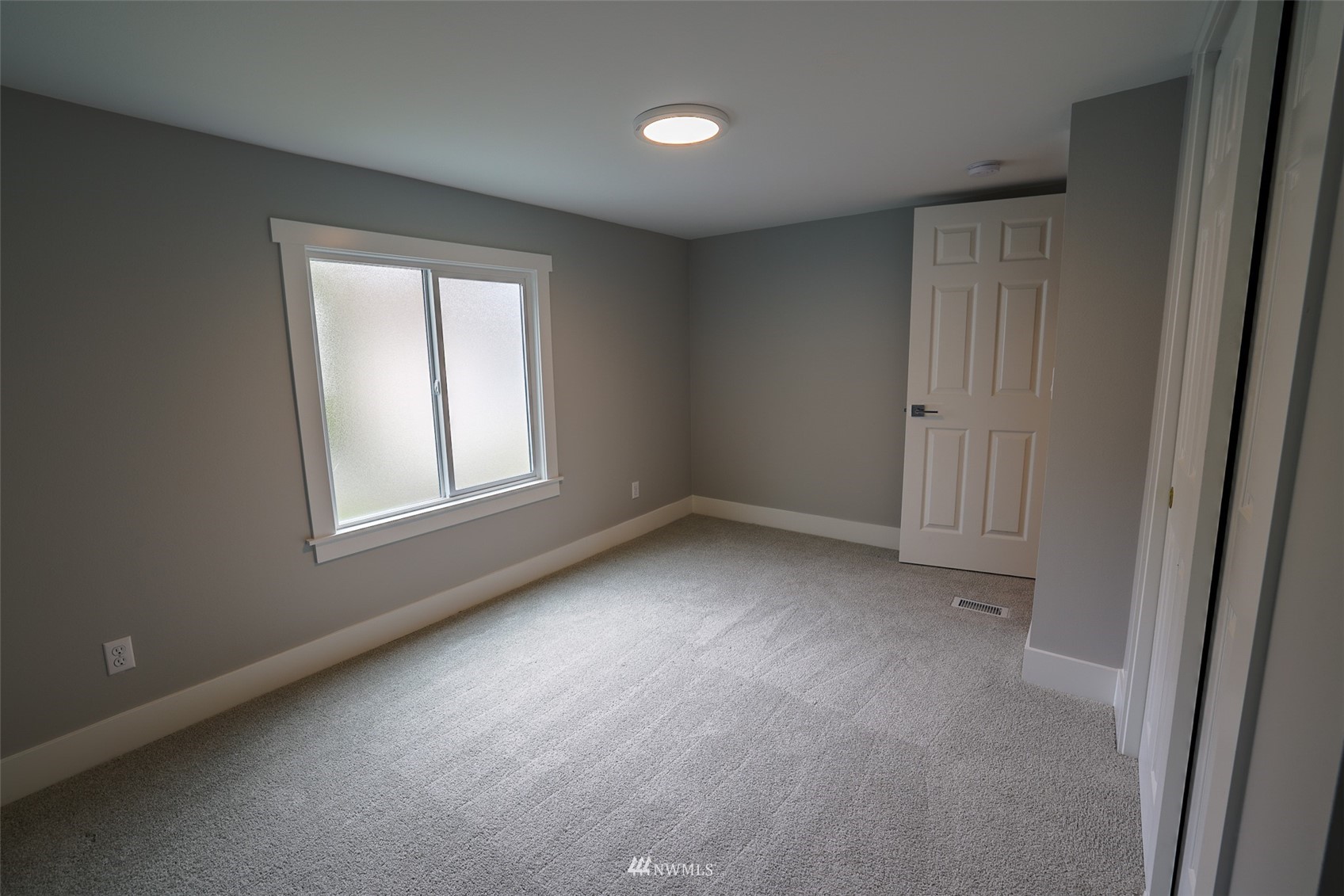 3504 Seattle Hill Road, Unit 2 Mill Creek, WA 98012 - Photo 22 of 30 a view of a livingroom with a window