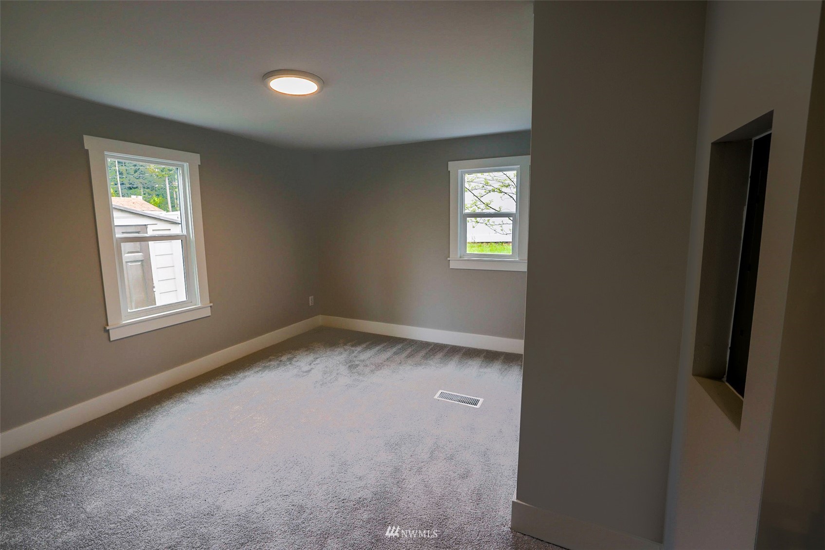 3504 Seattle Hill Road, Unit 2 Mill Creek, WA 98012 - Photo 24 of 30 an empty room with a window