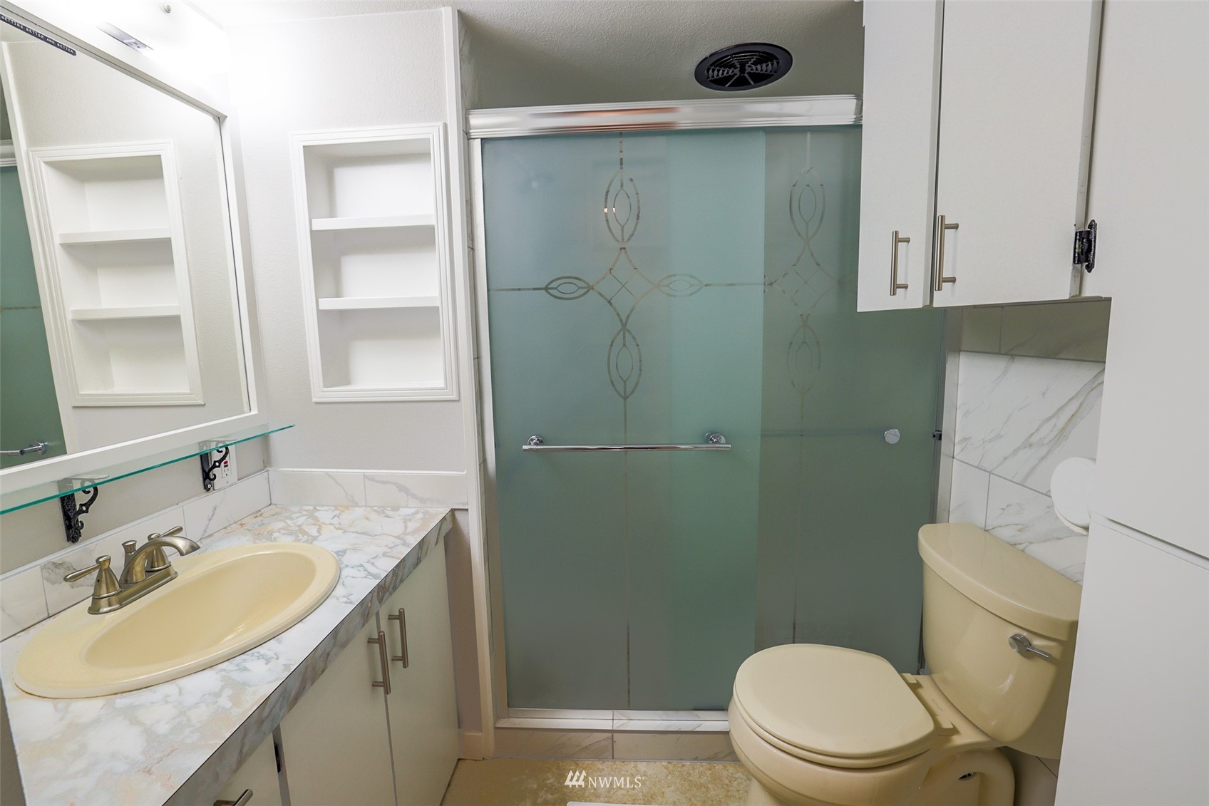 3504 Seattle Hill Road, Unit 2 Mill Creek, WA 98012 - Photo 27 of 30 a bathroom with a granite countertop sink toilet and shower